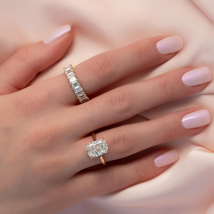 East west cushion diamond engagement ring worn on the hand