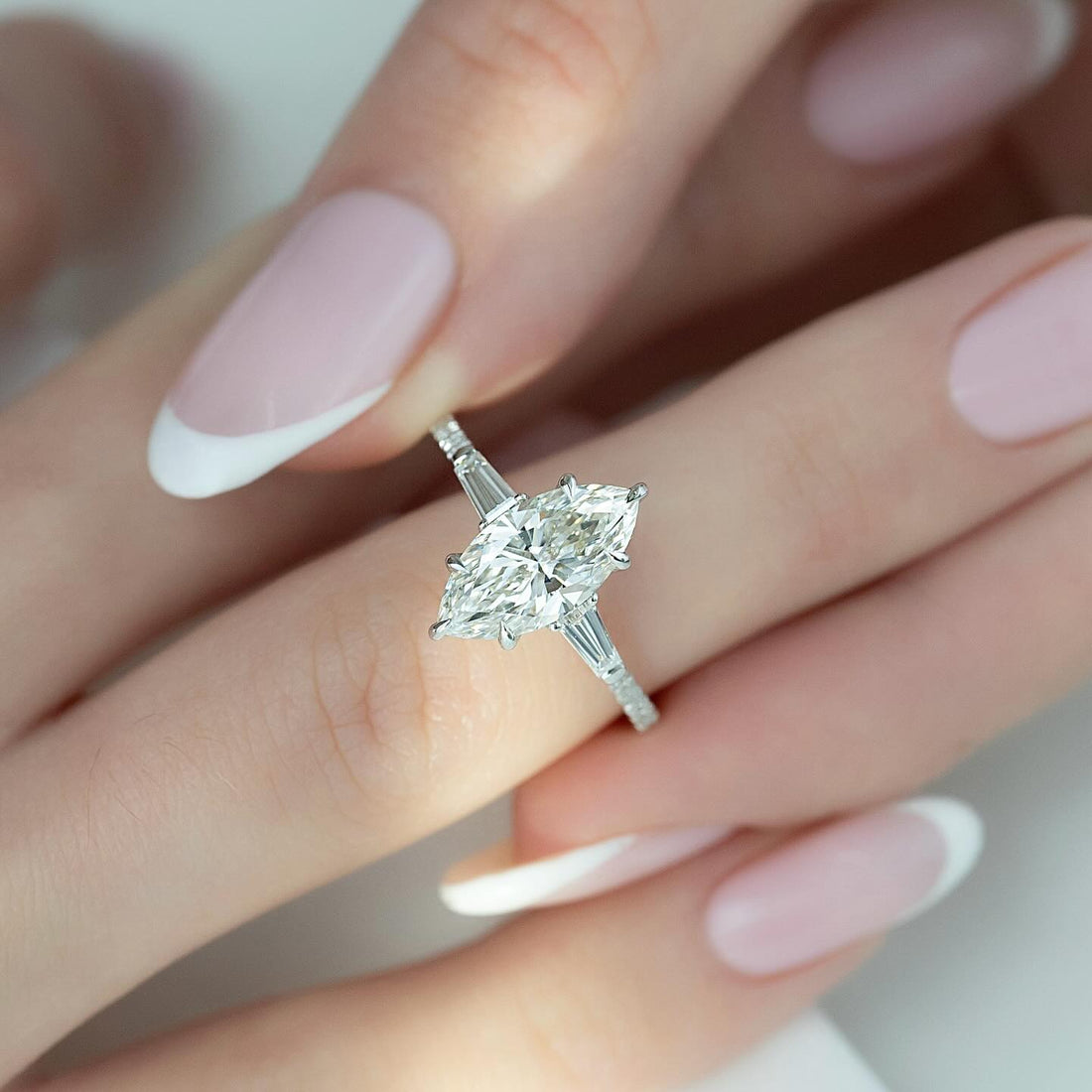 Marquise cut lab grown diamond ring in white gold with tapered baguette side stones