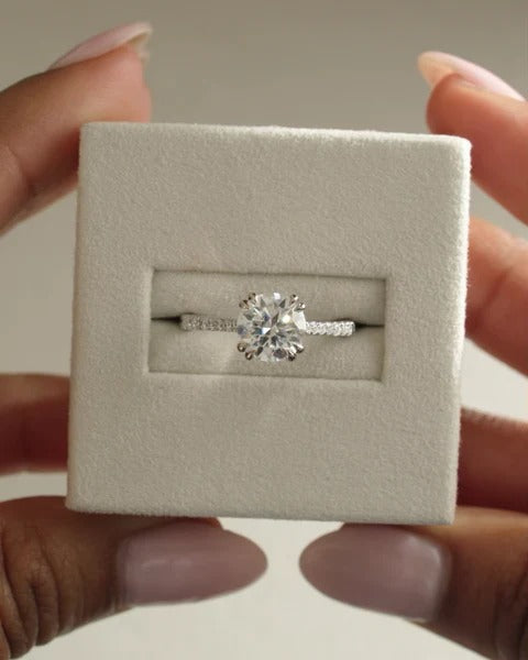 Round cut lab grown diamond cathedral pave ring with hidden halo