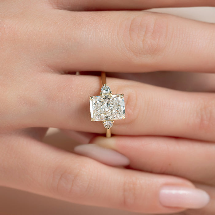 Three stone radiant diamond engagement ring detail view
