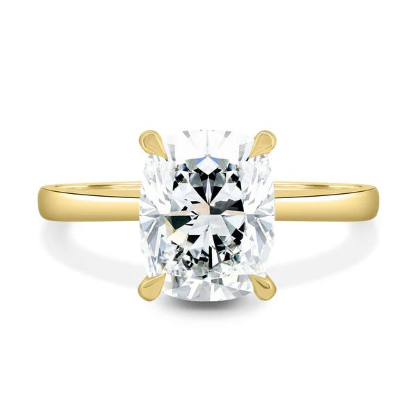 Elongated cushion cut lab grown diamond four claw ring on a plain band