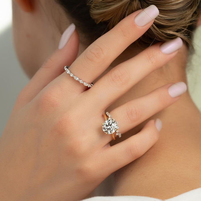 Classic round diamond solitaire engagement ring detail view