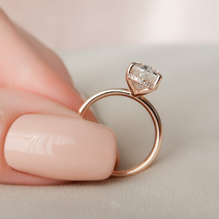 Oval cut lab grown diamond avant garde engagement ring, angled view