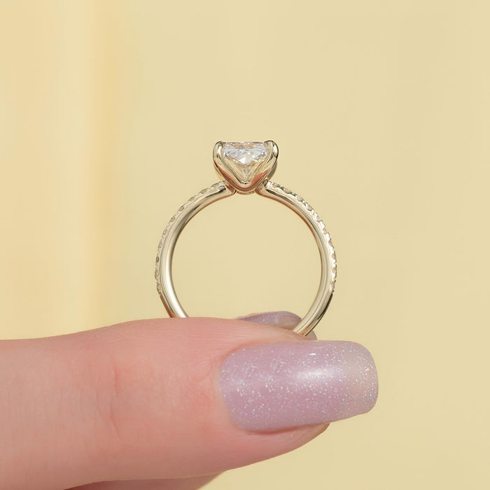 Profile showing the hidden halo and pave set shoulders of the radiant cut ring