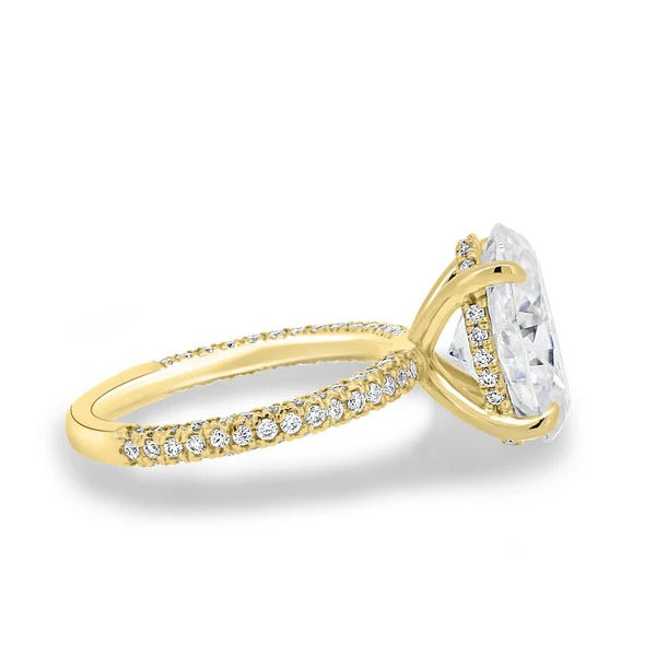 Three rows of pave and oval hidden halo visible in side profile