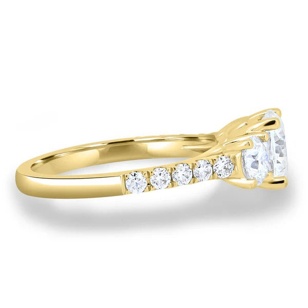 Round diamond trilogy ring with pave shoulders side profile
