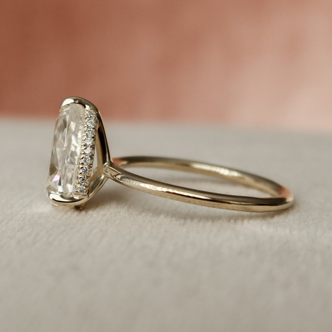 Mid century pear cut lab grown diamond anniversary ring, front view