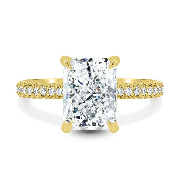 Elongated radiant cut lab grown diamond hidden halo ring on three row pave band