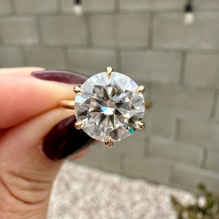 Round brilliant lab grown diamond Art Deco engagement ring, angled view