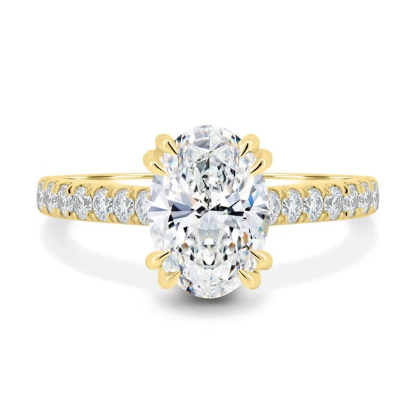 Oval cut lab grown diamond ring with double tipped claws and pave band