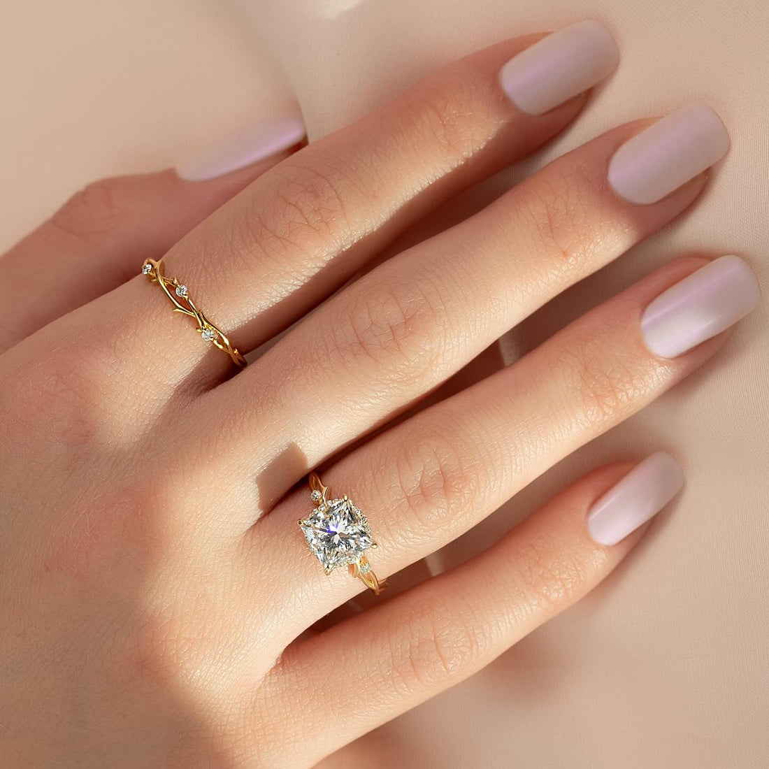 Princess cut lab grown diamond ring on a twisted vine band in yellow gold