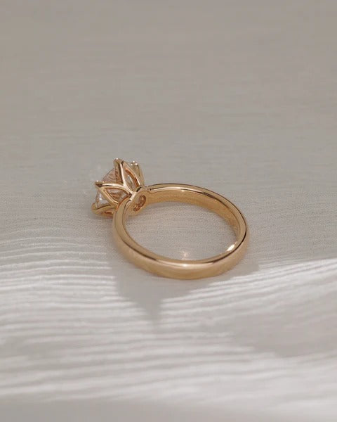 Wide cigar band round diamond solitaire ring side profile