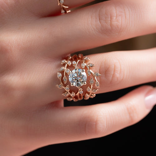 Leaf and vine lab grown diamond bridal ring set in rose gold worn on hand