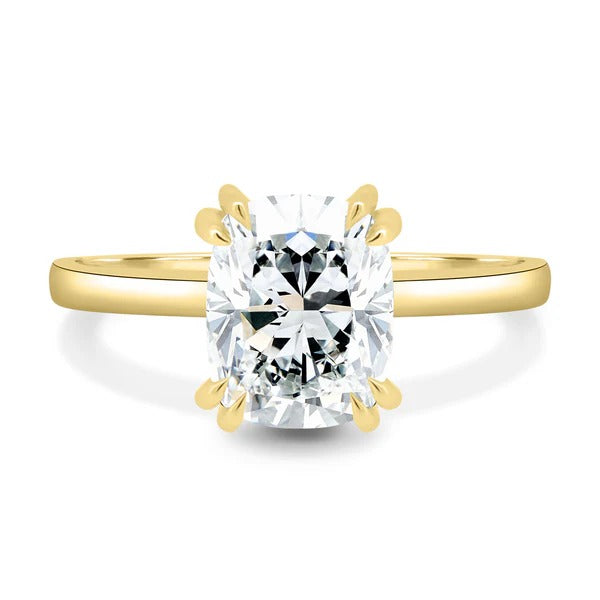 Elongated cushion cut lab grown diamond ring with double tipped claws