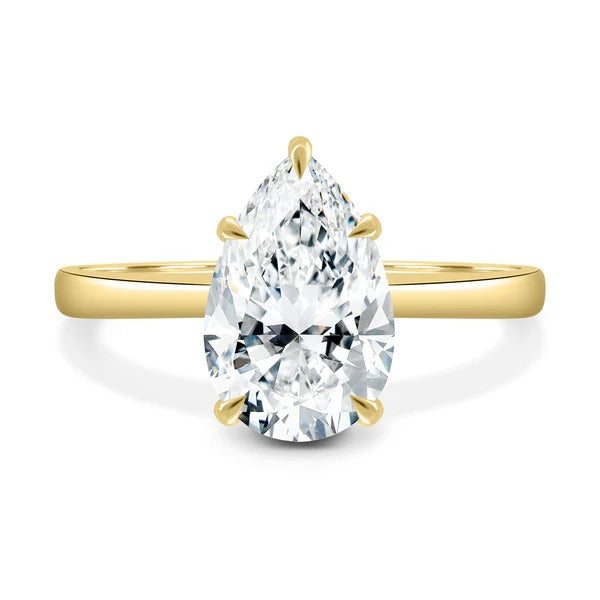 Pear cut lab grown diamond five claw solitaire ring on flat band