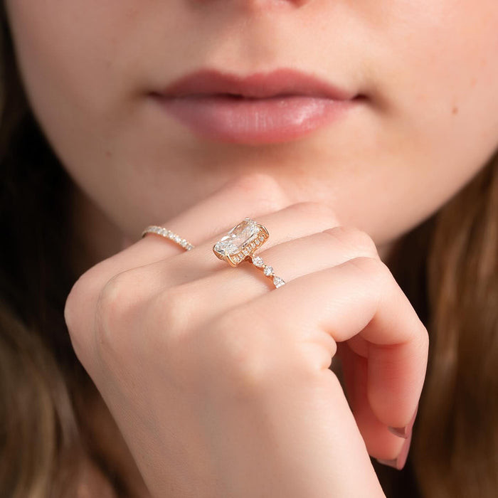 Radiant cut lab grown diamond with alternating accent stations on the band