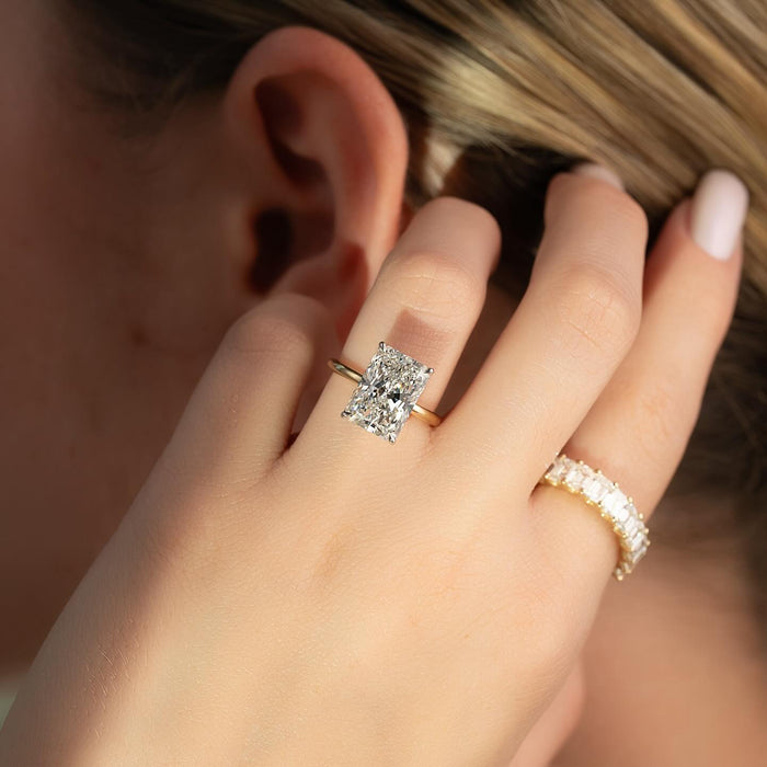 Elongated radiant diamond engagement ring detail view