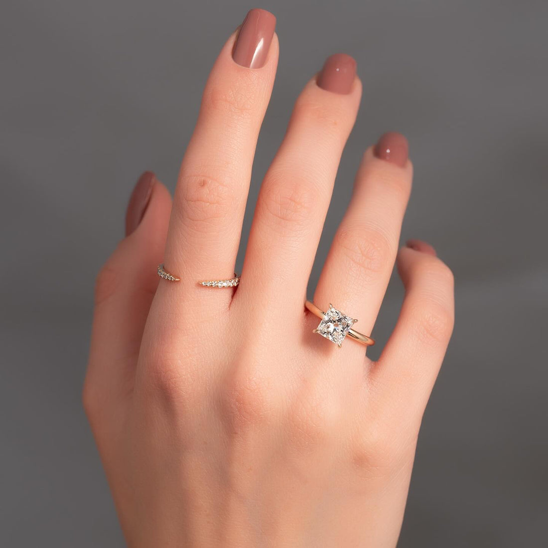 Square radiant cut lab grown diamond hidden halo ring in rose gold worn on the hand