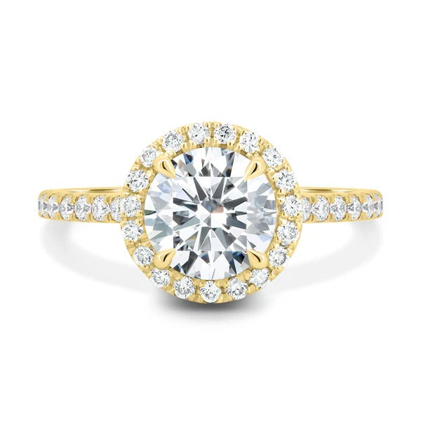 Round cut lab grown diamond cathedral halo ring with pave band