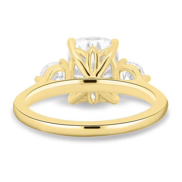 Cushion cut diamond trilogy ring with round sides gallery view