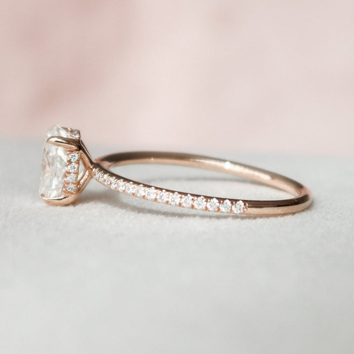 Oval cut lab grown diamond Art Nouveau engagement ring, angled view
