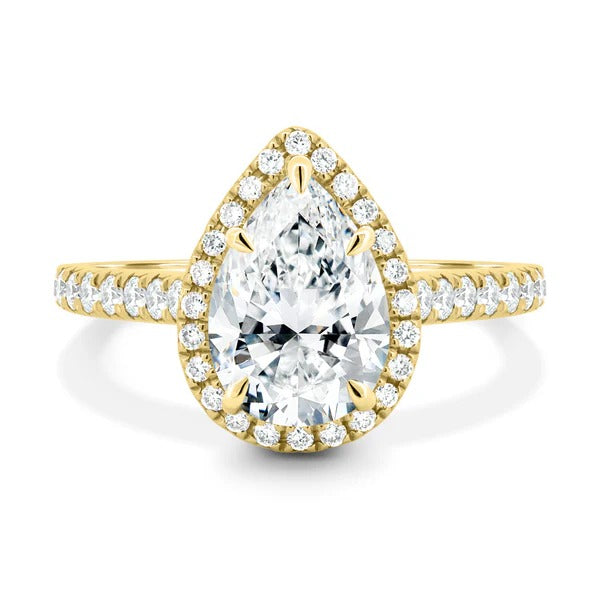 Pear cut lab grown diamond cathedral halo ring with pave band