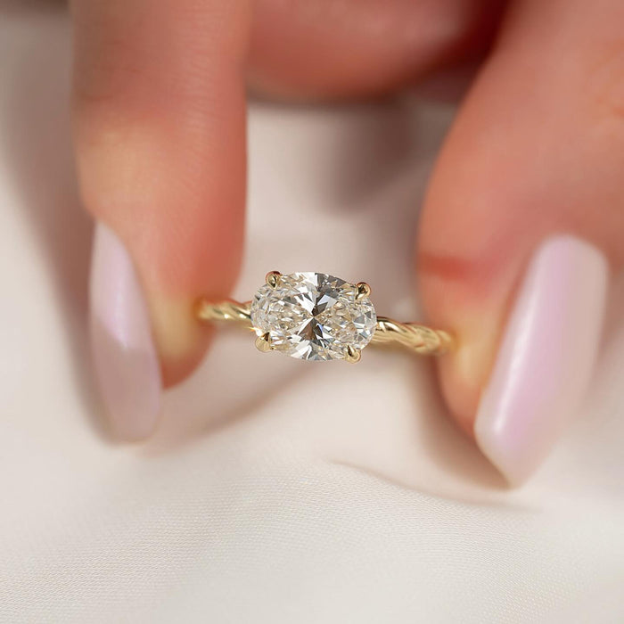 Hidden halo beneath the round brilliant diamond on the rope shank
