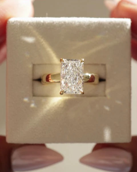 Radiant cut lab grown diamond ring with hidden halo on cigar band