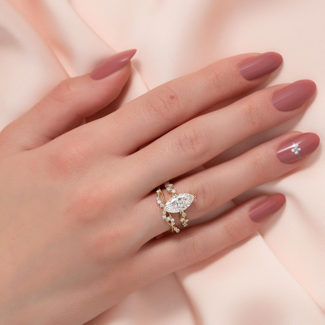 Marquise cut lab grown diamond bridal set with vine accents in yellow gold