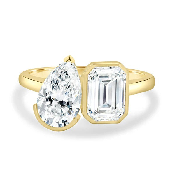 Pear and emerald cut lab grown diamond bezel set toi et moi ring