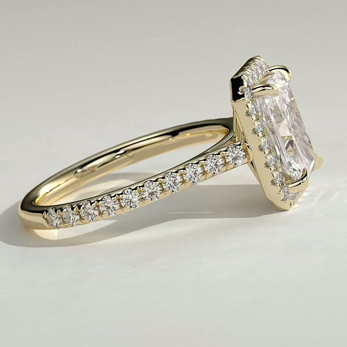 Side view of the rectangular halo and pave shoulders