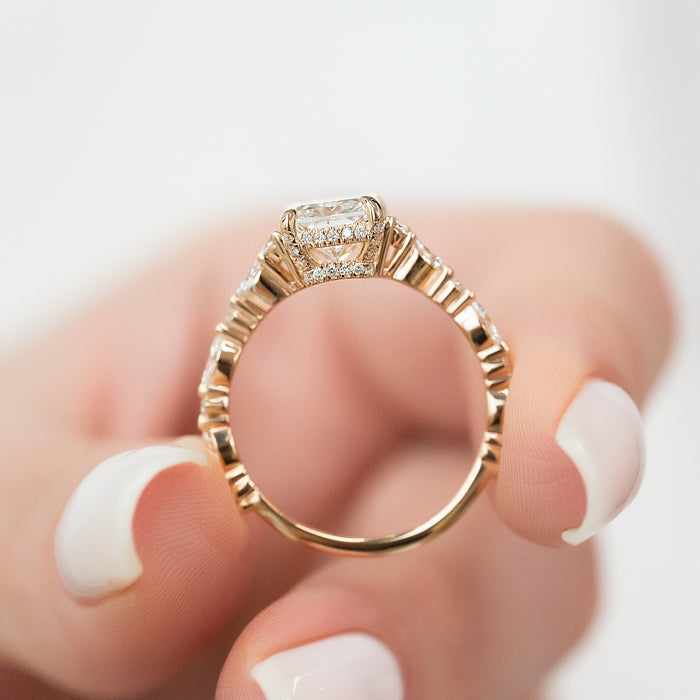 Profile of radiant diamond ring showing hidden halo and tapered shank