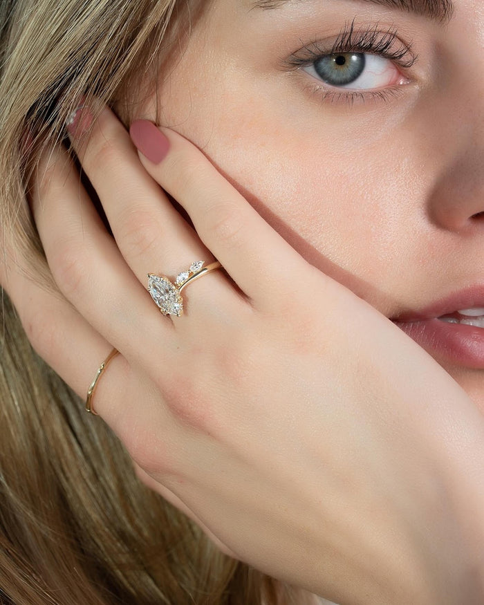 Marquise lab grown diamond engagement ring with marquise accent stones