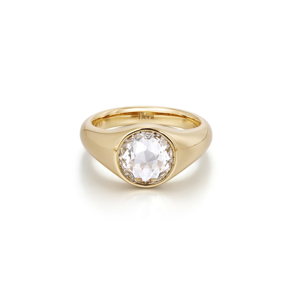 Side profile of a rose cut lab grown diamond flush set into a domed gold signet
