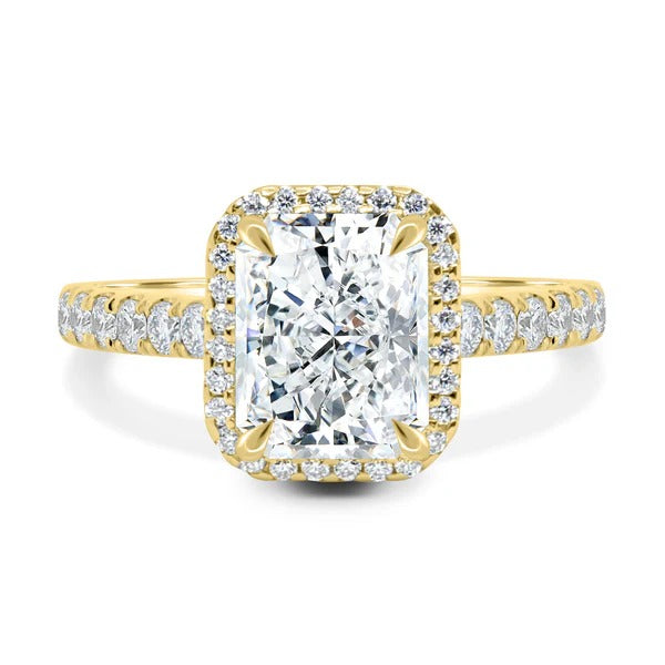 Radiant cut diamond micro pave halo ring on hand