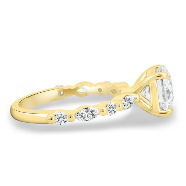 Round cut lab grown diamond solitaire with marquise and round station set accent band