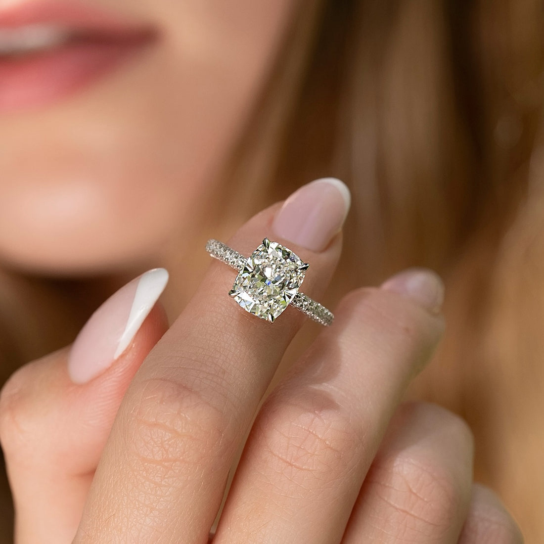 Cushion cut lab grown diamond ring with single row pave band in white gold