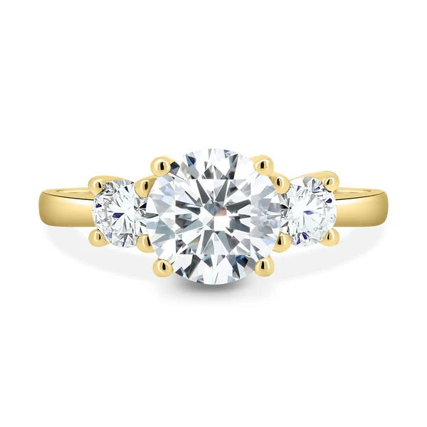 Round cut lab grown diamond trilogy ring in trellis setting