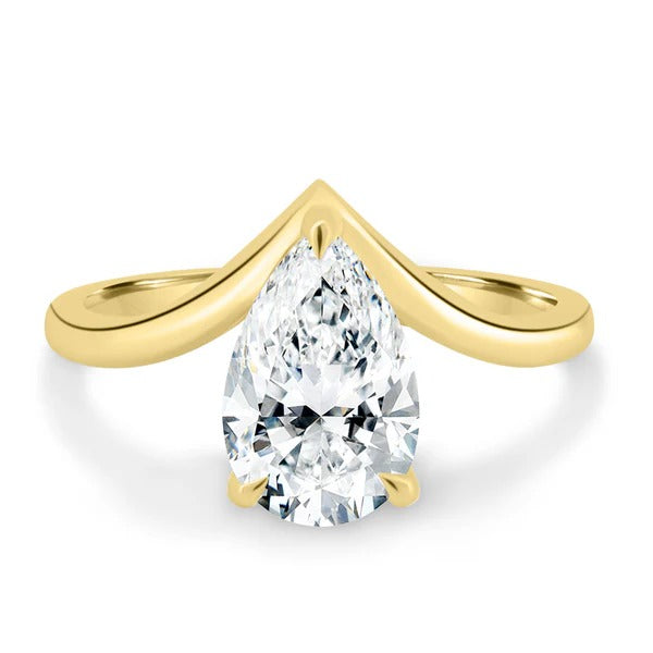 Pear cut lab grown diamond solitaire ring on a chevron V shaped band