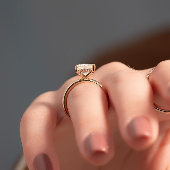 Pave hidden halo beneath the square radiant centre diamond