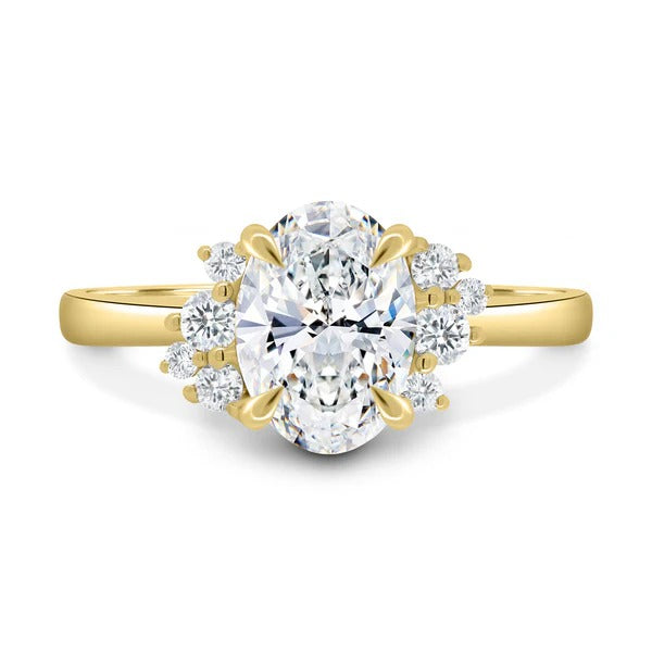 Oval cut lab grown diamond solitaire ring with diamond cluster accents