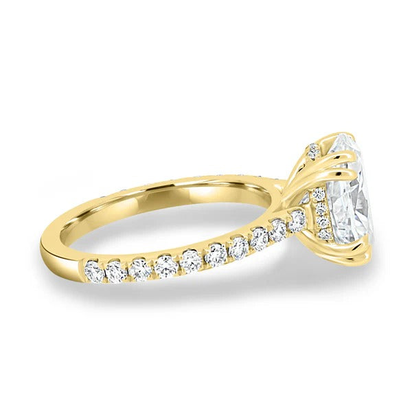 Side view showing the hidden halo beneath the oval diamond
