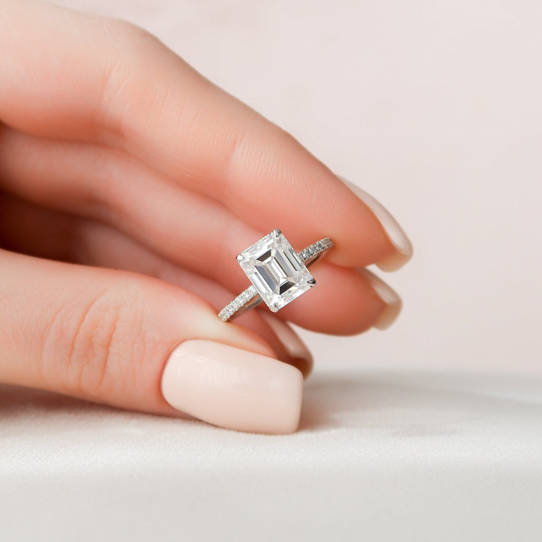 Minimalist emerald cut lab grown diamond anniversary ring, front view