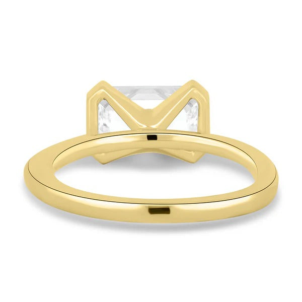 East west half bezel emerald cut diamond ring detail