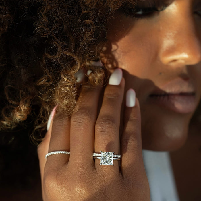 Corner claws holding the princess cut lab grown diamond