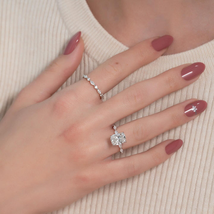 Elongated cushion lab grown diamond hidden halo ring in white gold worn on the hand