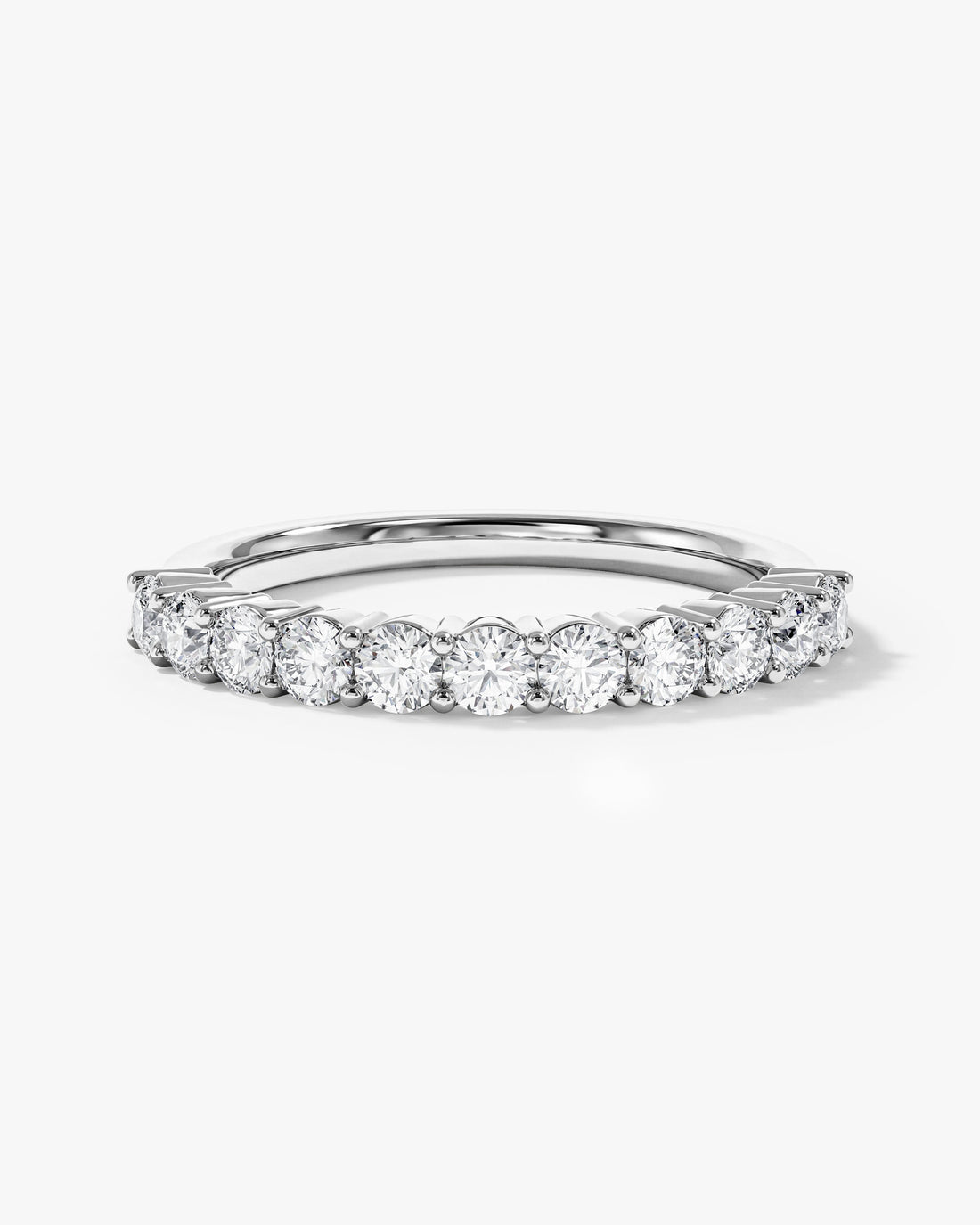 2.5mm round moissanite faceted half eternity wedding band in white gold, front view