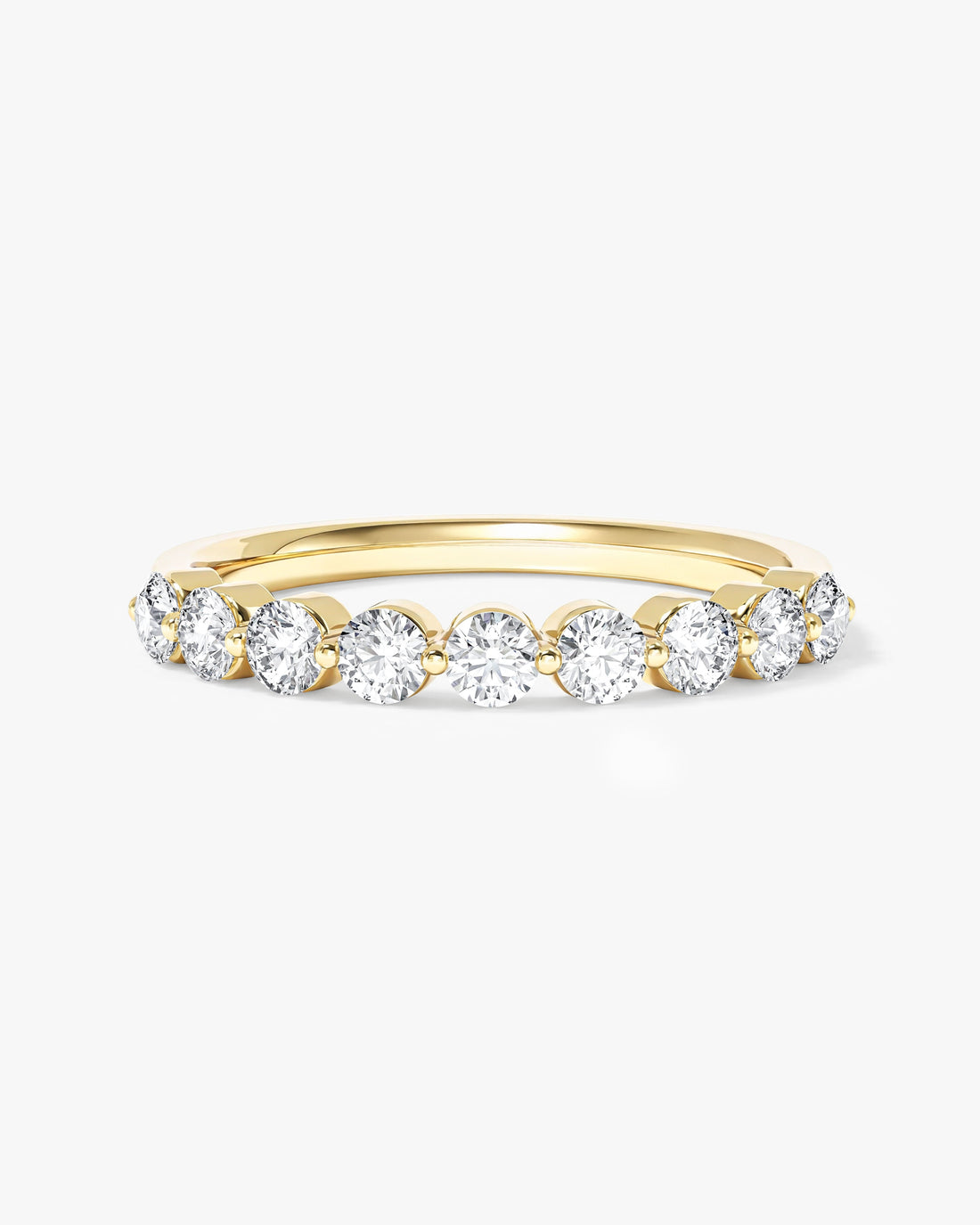 2.5mm round moissanite single prong half eternity wedding band in yellow gold, front view