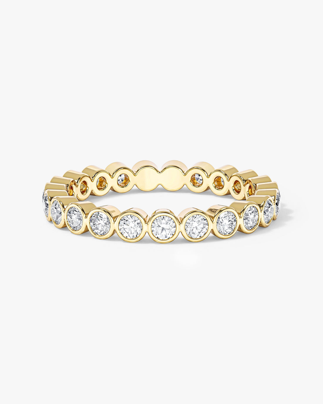 2.8mm round moissanite bezel eternity wedding band in yellow gold, front view