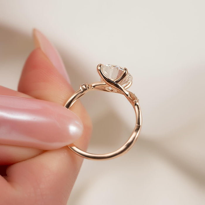 Round moissanite vine branch solitaire ring side profile in rose gold